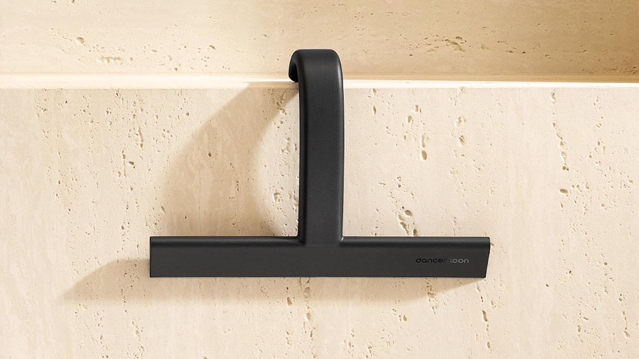 JustHang Compact Squeegee_hanging in a shower niche