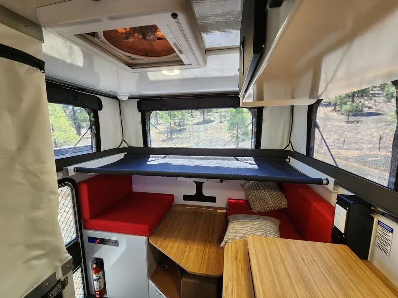 Hudson Bay Flatbed Pop-Up Truck Camper Fits Wet Bathroom, Without Cramping Up Kitchen