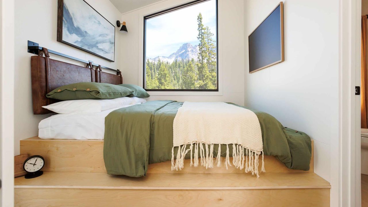 A-Frame Classic Tiny House_master bedroom with platform bed