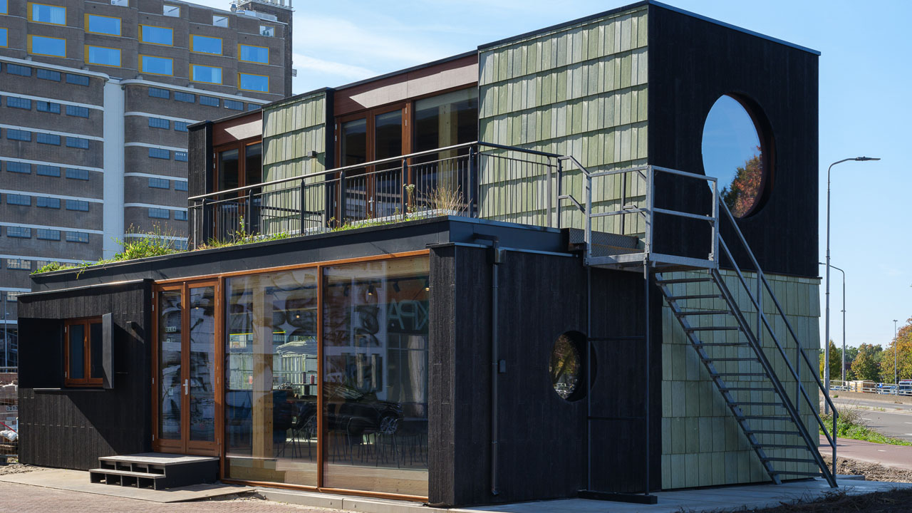 Carbon-Negative Recycled PVC Tile Cladding_charred wood façade